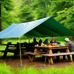 타프 활용법 - **Prompt: A serene and cozy outdoor kitchen setup under a vibrant, waterproof tarp on a slightly rai...